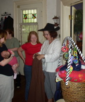 Ginny helps Rebecca with her skirt